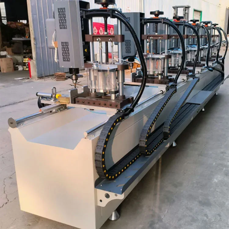 Trapano per facciate continue CNC a 8 mandrini