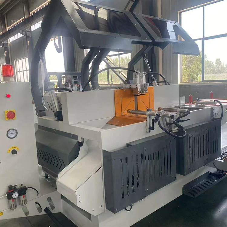 Troncatrice automatica a doppia testa CNC per porte finestre in alluminio